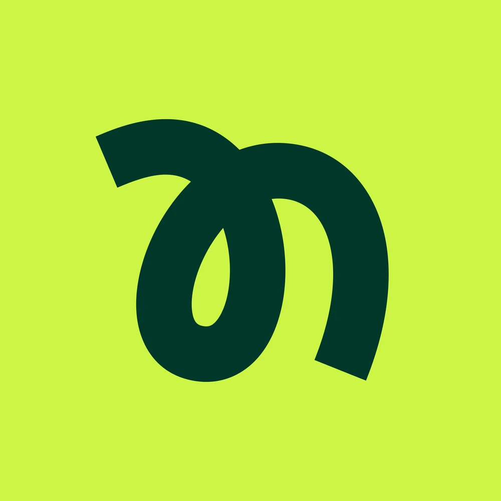 Nomi — логотип